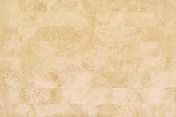 Beige travertine tile wall texture or background	