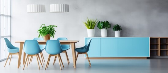 Modern and Bright Flat Dining Room Interior with Blue Table and Chairs