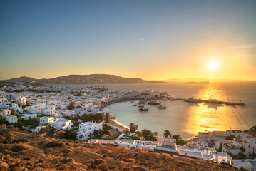 Dreamy sunset near the coast of Mykonos, Cyclades, Greece