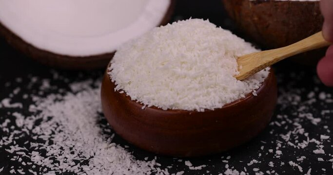 dry white coconut chips for adding to desserts, finely chopped coconut pulp dried in sugar syrup
