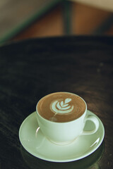 Drink coffee while working on a casual day.