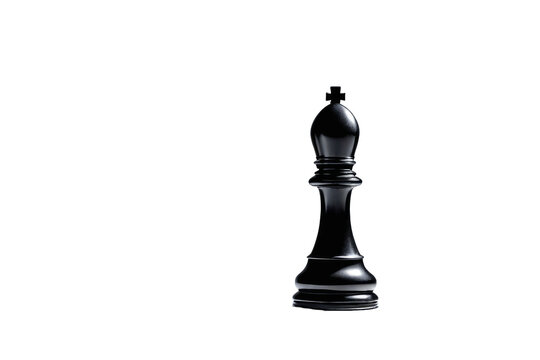 Black bishop chess piece centered on a pristine white backdrop, full frame, high contrast between the ebony figure and the stark background, shadow detail emphasizing shape, stock photo
