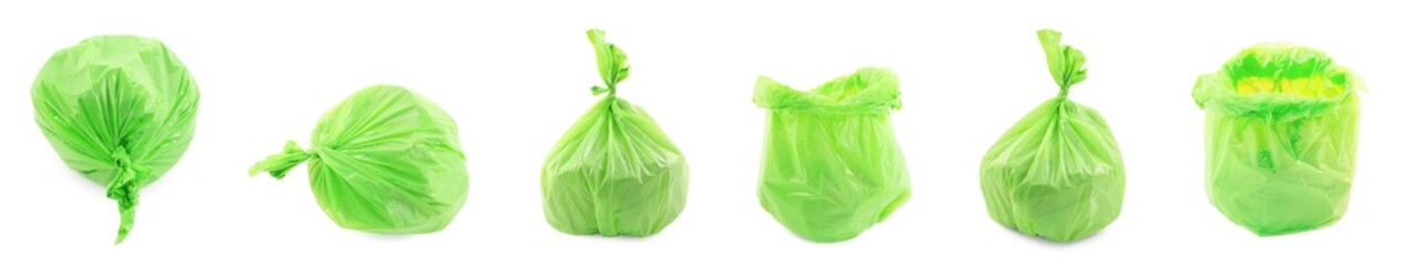 Green plastic garbage bags isolated on white, set