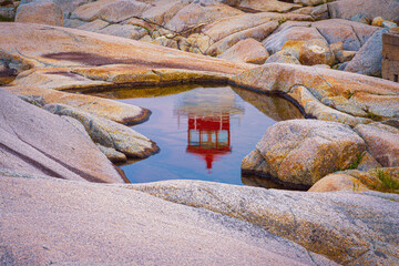Reflecting on Peggy’s Cove Lighthouse