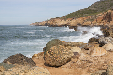 Waves breaking on cliffs, San Diego, California