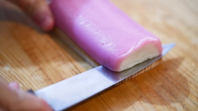 slicing kamaboko