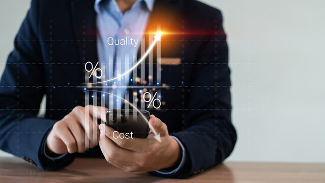 Cost and quality control, business strategy and project management concept. Businessman working on digital tablet with quality control growth graph and cost reduction, effective business
