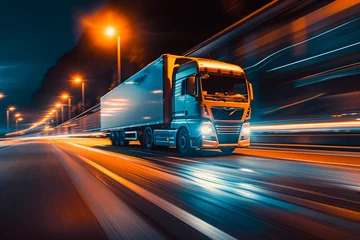 Tuinposter Truck on highway, speedway, street in night time. Motion blur, light trails. Transportation, logistic, highway traffic concept. © MVProductions