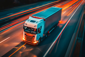 Truck on highway, speedway, street in night time. Motion blur, light trails. Transportation, logistic, highway traffic concept.