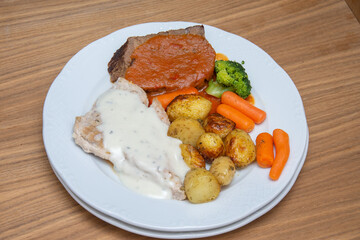Pork steak with carrots and broccoli