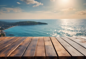 Naklejka na ściany i meble Wooden table top with blurred sea and coastline background, ideal for product display.
