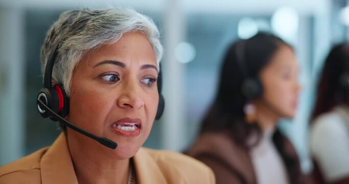 Senior woman, consulting and call center with headphones in customer service or support at office. Mature female person, consultant or agent talking for online advice, assistance or help at workplace