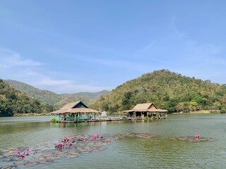 Fototapeta na wymiar Wong Valley Reservoir Ban Phu Nam Ron Community Forest - Hin Lad, a natural tourist attraction, forest, mountains, water, sky, sleeping under the stars, suitable for camping