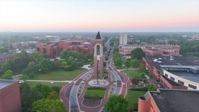Aerial Dawn over Ball State University with Bell Tower Arc Shot