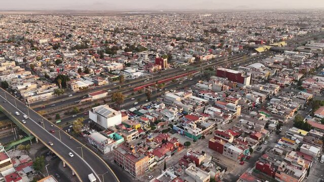 Slow motion drone footage of the Metropolitan Area of Mexico City, including Ecatepec