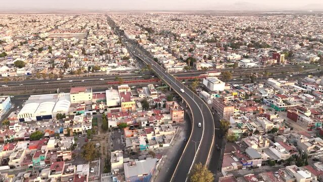 Slow motion drone footage of the Mexico City Metropolitan Area, showcasing Ecatepec