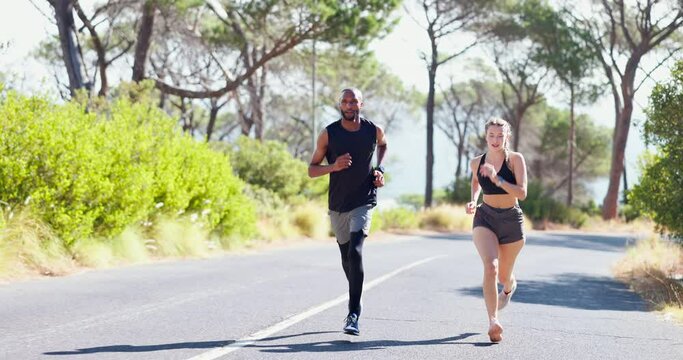 Friends, running and training for sports on street, cardio and performance for fitness outdoors. People, road and workout challenge for health, support and together for exercise or active in nature