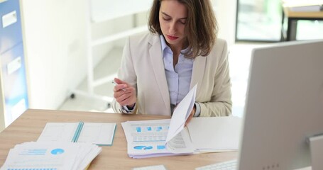 Entrepreneur checks new documents and after reading rules signs