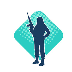 Silhouette of a female soldier carrying machine gun weapon.
