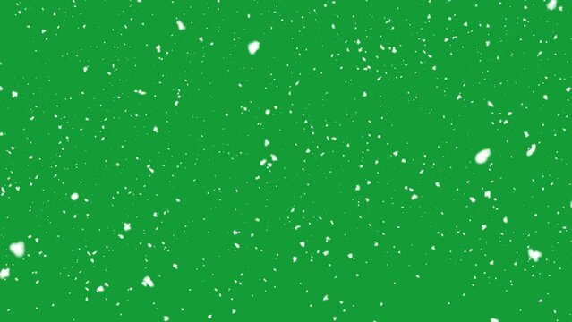 
Snow falling on green background