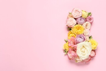 8 March greeting card design made with beautiful flowers on pink background, top view. Space for text