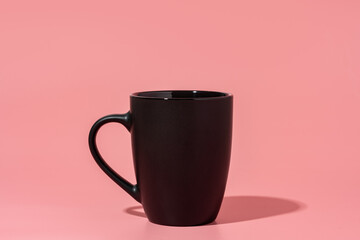Ceramic mug mock up on pink background studio shot