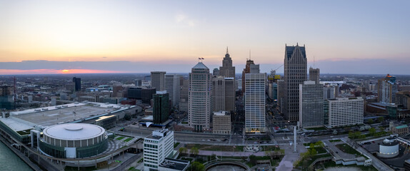  Aerial view of Detroit downtown under evening sunlight. Second biggest metropolitan area in American mid west.