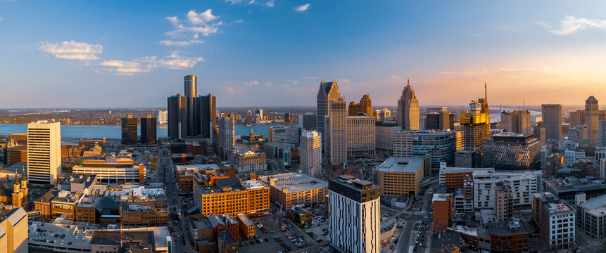 Aerial view of Detroit downtown under evening sunlight. Second biggest metropolitan area in American mid west.