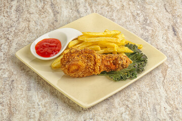 Crispy chicken leg with fry potato