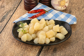 Raw scallop seafood in the bowl