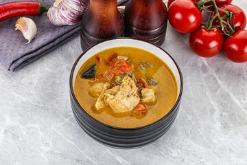 Traditional yellow Thai curry with chicken
