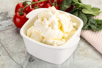 Soft cream cheese in the bowl