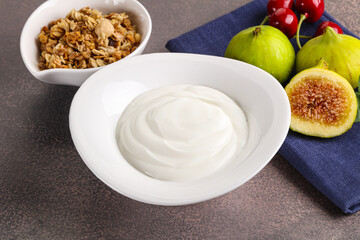 Traditional homemade Greek yoghurt with granola