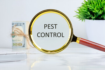 Pest control phrase written through a magnifying glass on a light background near a roll of money...