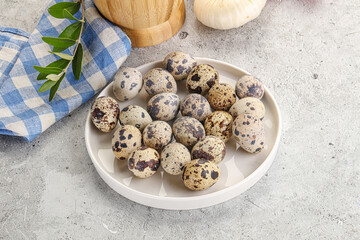 Raw quail eggs in the bowl