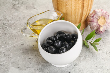 Black olives with oil and branch