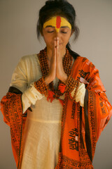 Traditional Indian woman. Woman praying to god.