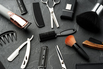 Set of tools for hairdressing and barbershop on gray background