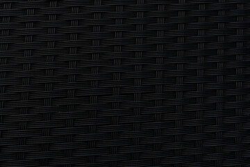 Black plastic weave texture background. - Powered by Adobe