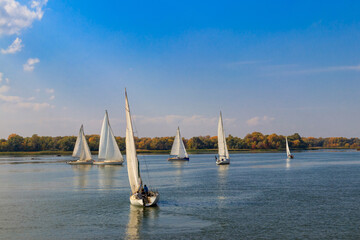 Obraz premium Yachts at sailing regatta on the Dnieper river in Kremenchug, Ukraine