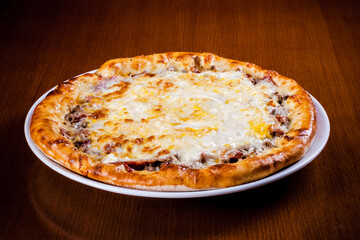 Baked Turkish Pita with Melted Cheese on Dark Wooden Table