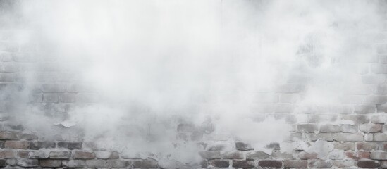 Brick wall obscured by white mist for texture or backdrop