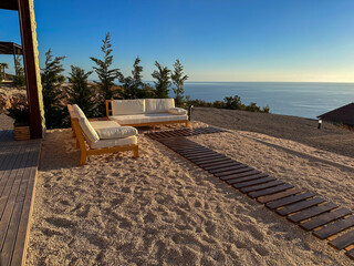 Relaxation area with panoramic sea view. Summer aesthetic