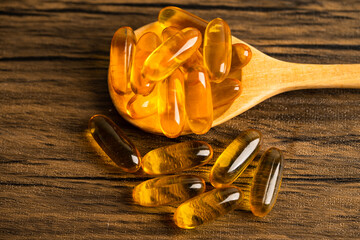 Fish oil Omega 3 capsules vitamin with EPA and DHA isolated on white background.