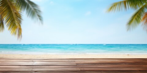 Montage of a tranquil tropical beach with a wooden table and space for product ad against a blurry sky and sea background.