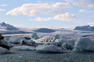 Iceland-Icebergs in Jökulsárlón glacier lagoon with Vatnajökull National Park in the background