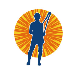 Silhouette of a female worker in pose holding cutting plier tool.