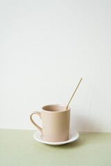 Ceramic mug cup on table. white ivory background