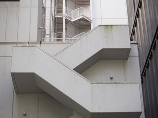 Staircases and a ladder on the outside of buildings in Tokyo.