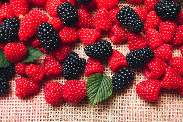 sweet raspberries and blackberries - delicious mix close-up